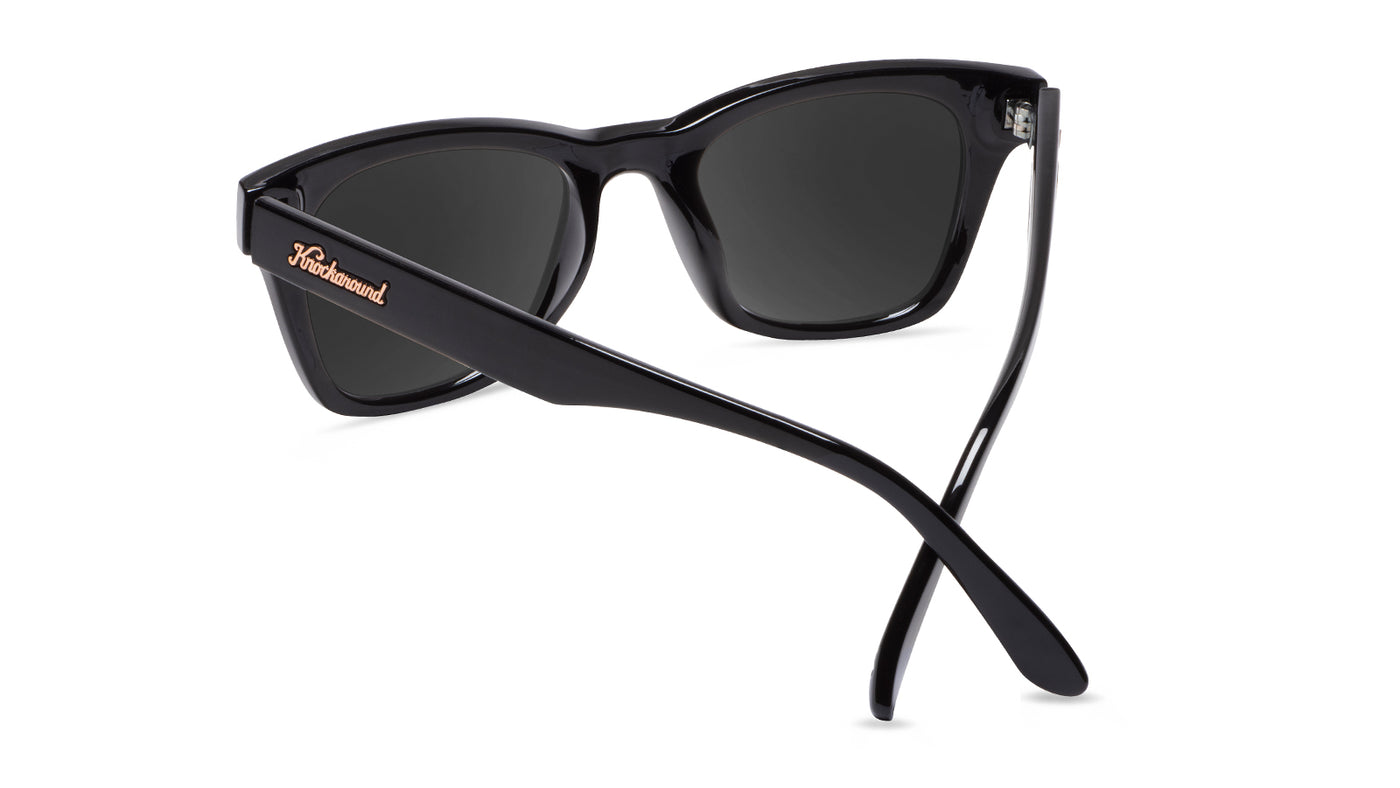 Sunglasses with Clear Black Frames and Polarized Peach Lenses, Back
