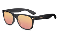 Sunglasses with matte black frames and polarized rose gold lenses. flyover