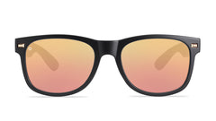 Sunglasses with matte black frames and polarized rose gold lenses. front