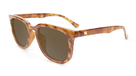 Glossy amber tortoise sunglasses with amber lenses