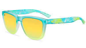 Sunglasses with aqua and yellow frames and polarized yellow lenses, flyover