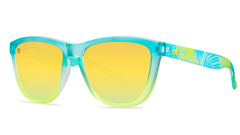 Sunglasses with aqua and yellow frames and polarized yellow lenses, threequarter