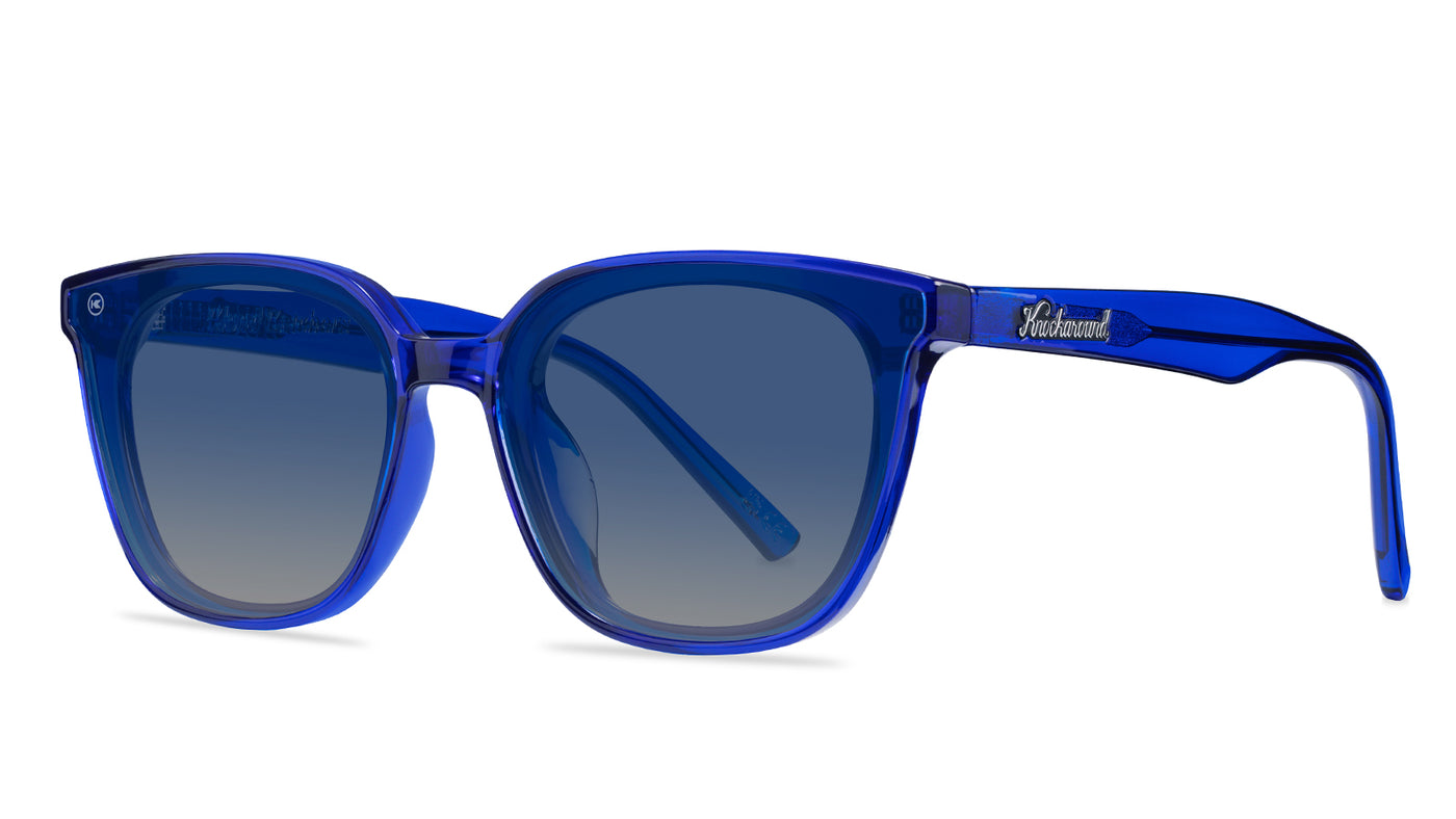 Sunglasses with a blue frame with polarized blue lenses, threequarter