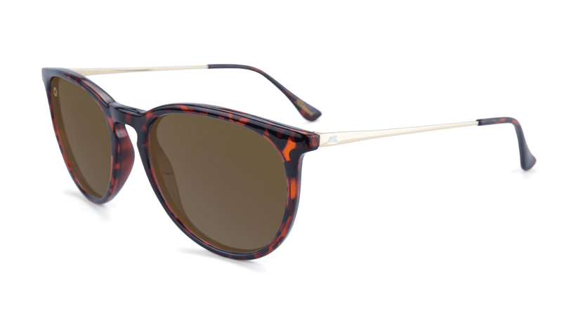 Tortoise shell sunglasses with gold arms and amber lenses