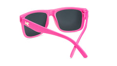 Sunglasses with pink frames and polarized pink lenses, back