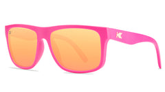 Sunglasses with pink frames and polarized pink lenses, threequarter