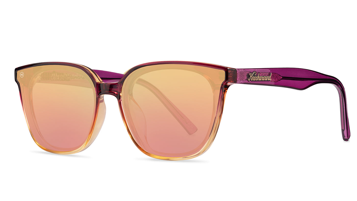 Sunglasses with purple frame with polarized pink lenses, threequarter