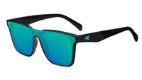 Sunglasses with a black frame with polarized green lenses, flyover