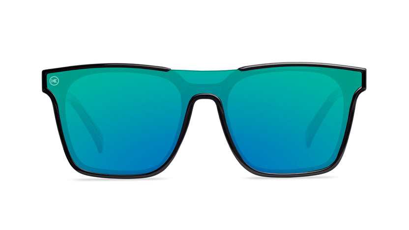 Sunglasses with a black frame with polarized green lenses, front