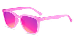 Sunglasses with pink frames and polarized pink lenses, flyover