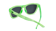 Sunglasses with green topographic frame and polarized green lenses, back