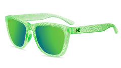 Sunglasses with green topographic frame and polarized green lenses, flyover