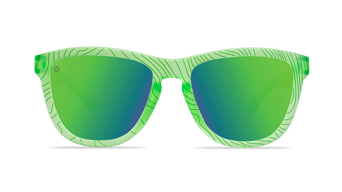 Sunglasses with green topographic frame and polarized green lenses, front