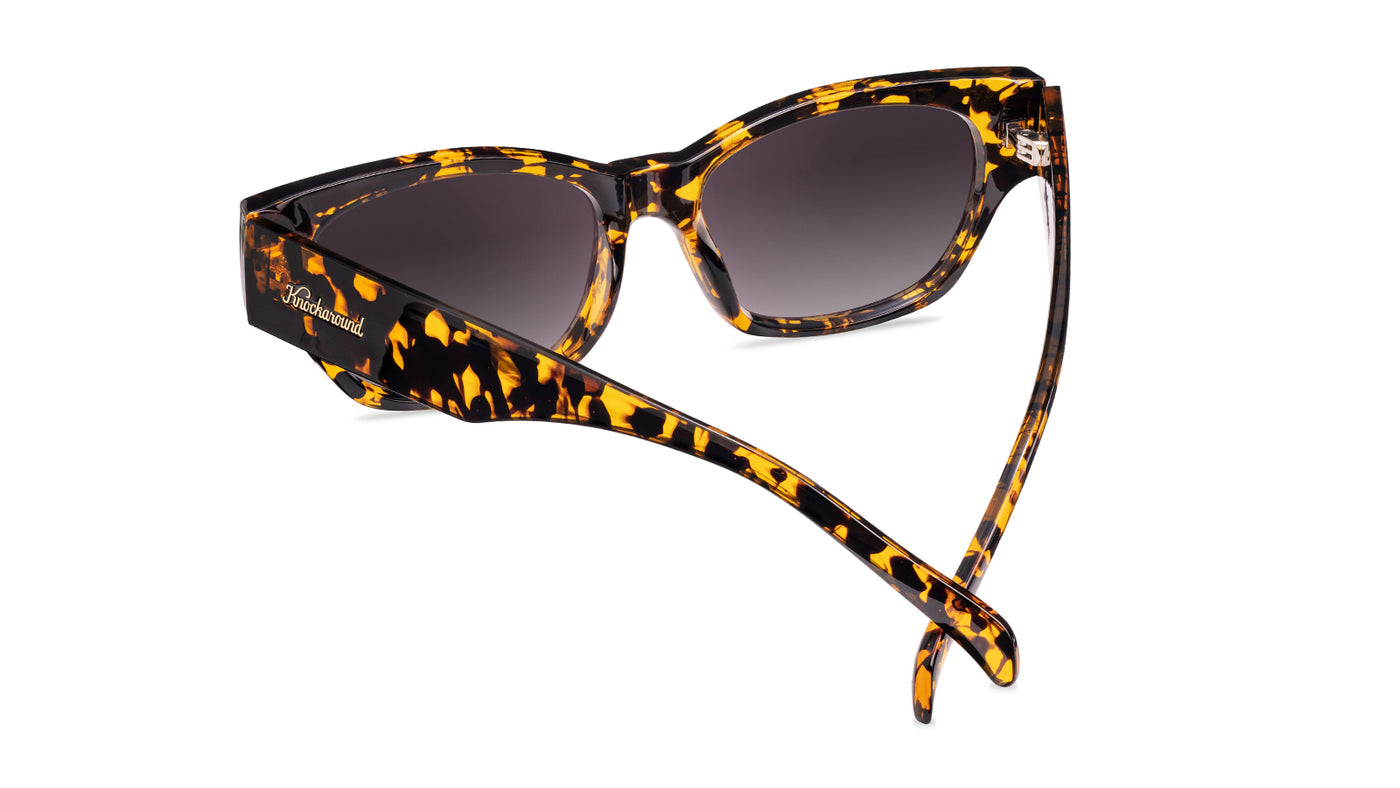 Sunglasses with an inky amber tortoise frame and polarized smoke gradient lenses, Back