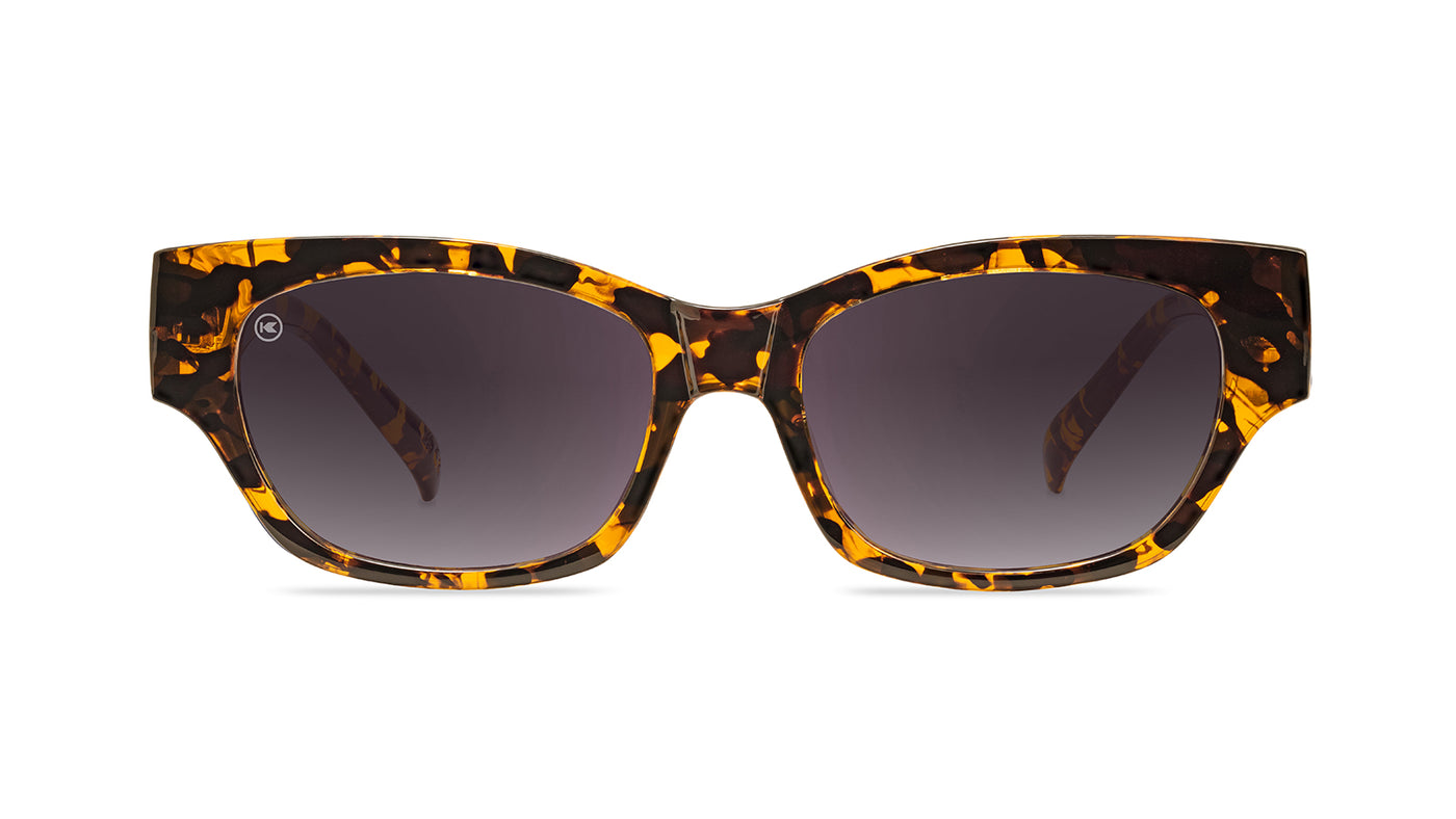 Sunglasses with an inky amber tortoise frame and polarized smoke gradient lenses, Front