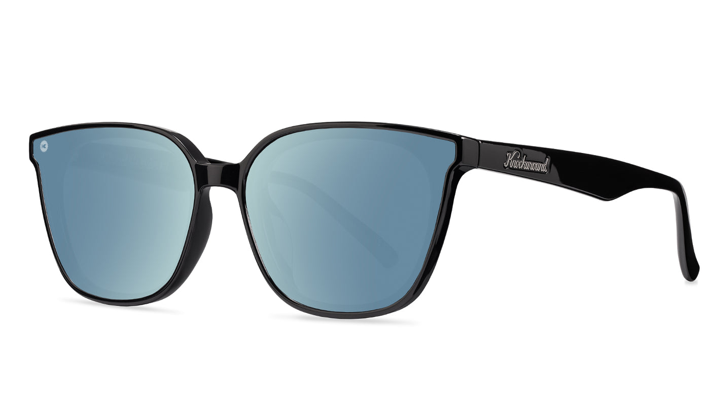 Sunglasses with a black frame with polarized blue lenses, threequarter