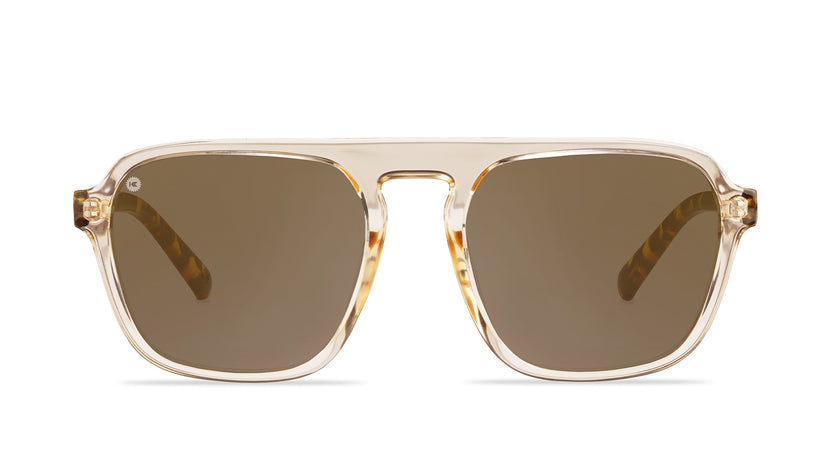 Sunglasses with Glossy translucent amber fronts Matte tortoise shell arms Polarized amber lenses