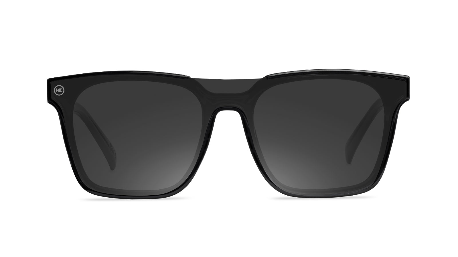 Sunglasses with a black frame with polarized black lenses, front