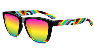 Sunglasses with Glossy black fronts with rainbow accent at bottom, Progress Pride color swirl across arms Silver K-logos Polarized rainbow lenses