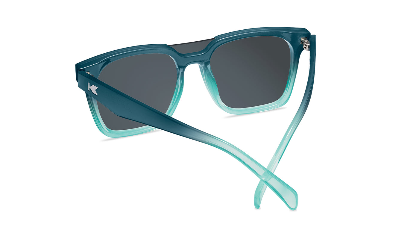 Sunglasses with a blue frame with polarized blue lenses, back