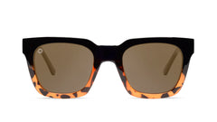 Sunglasses with a glossy black and tortoise shell frame with polarized amber lenses, front