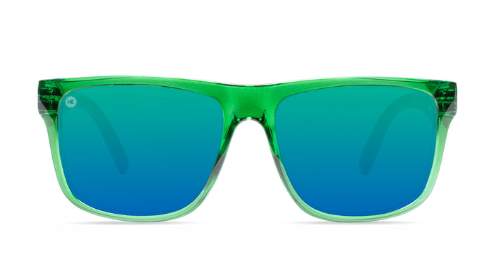 Sunglasses with glossy green fronts, wooden arms and polarized green lenses,front