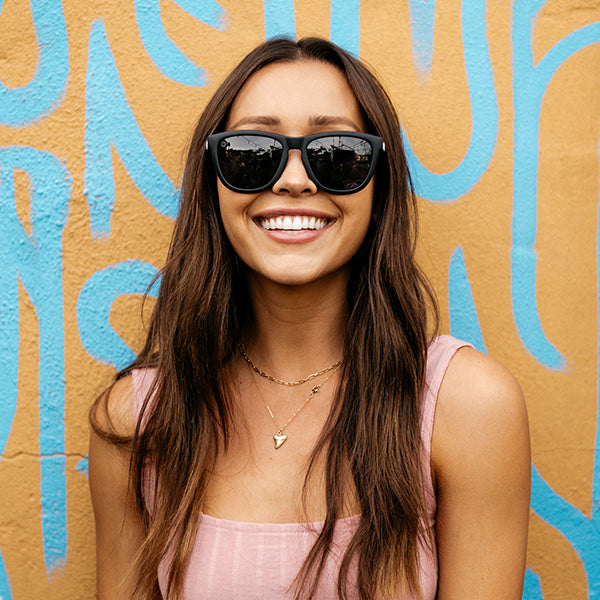 Women wearing Black / Smoke Premiums Sunglasses