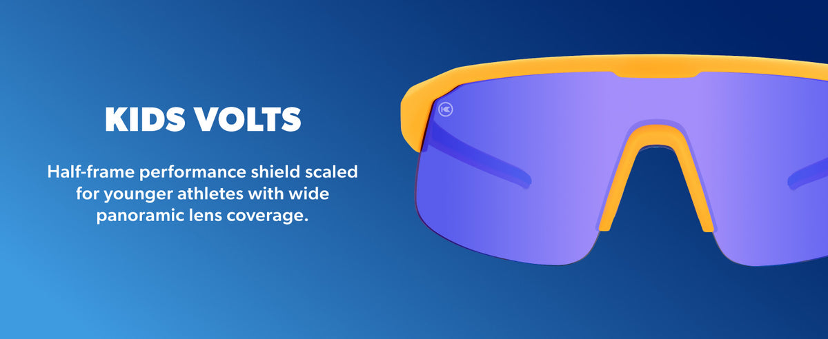 Kids Volts. Half frame performance shield scaled for younger athletes with wide panoramic lens coverage.