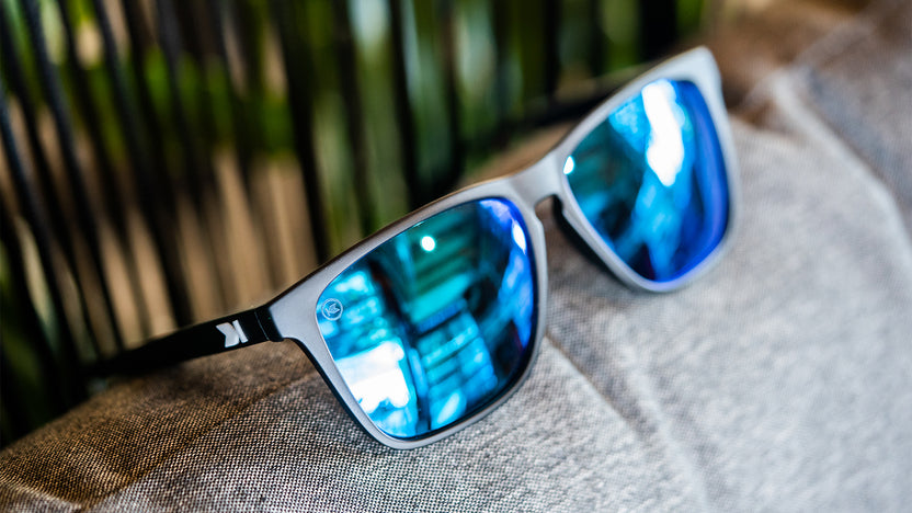 Sunglasses with Matte Black Frames and Polarized Blue Moonshine Lenses