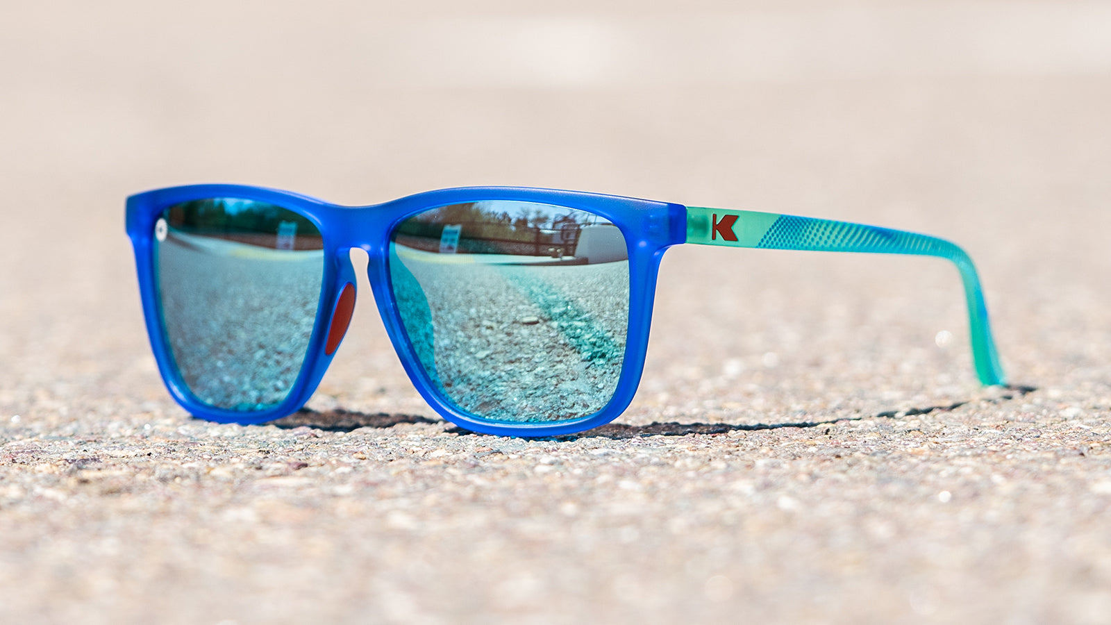 Sport Sunglasses with Blue Fronts and Mine Green Arms and Polarized Aqua Lenses