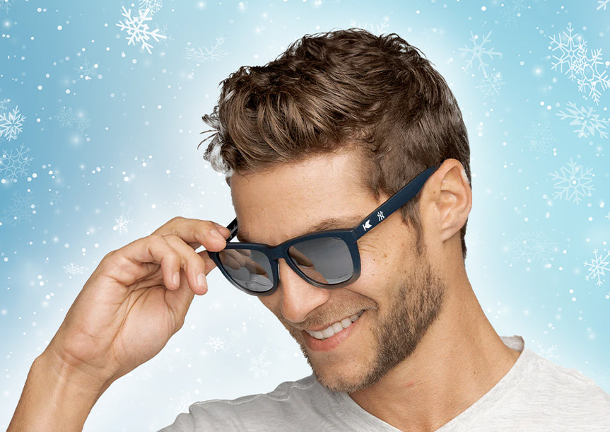 Gift Guide For The Sports Fan: Man wearing New Your Yankees Premiums Sport sunglasses