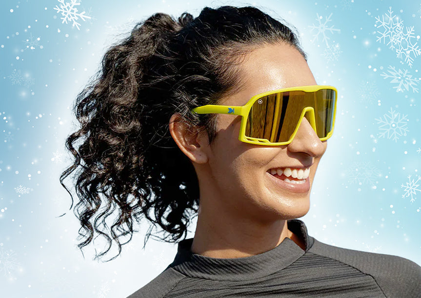 Gift Guide For The Athlete: Woman wearing Rubberized High Voltage Campeones sunglasses