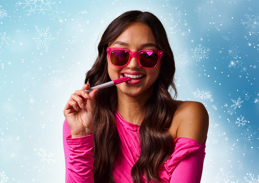 Gift Guide For The TV and Movie Buff: Woman wearing Mean Girls Songbirds sunglasses