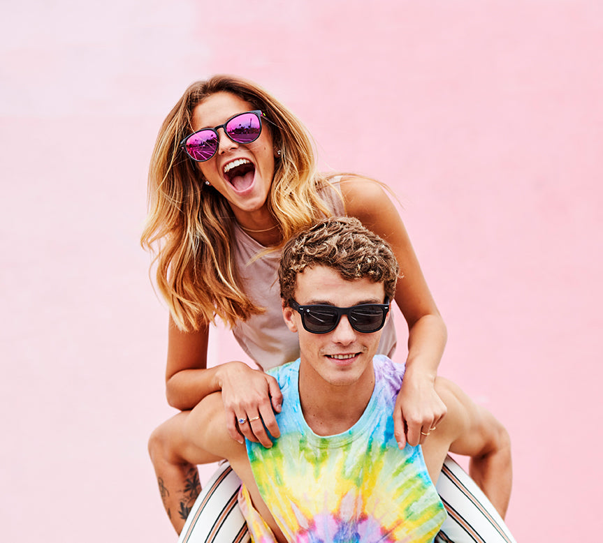 Man and woman wearing Knockaround sunglasses