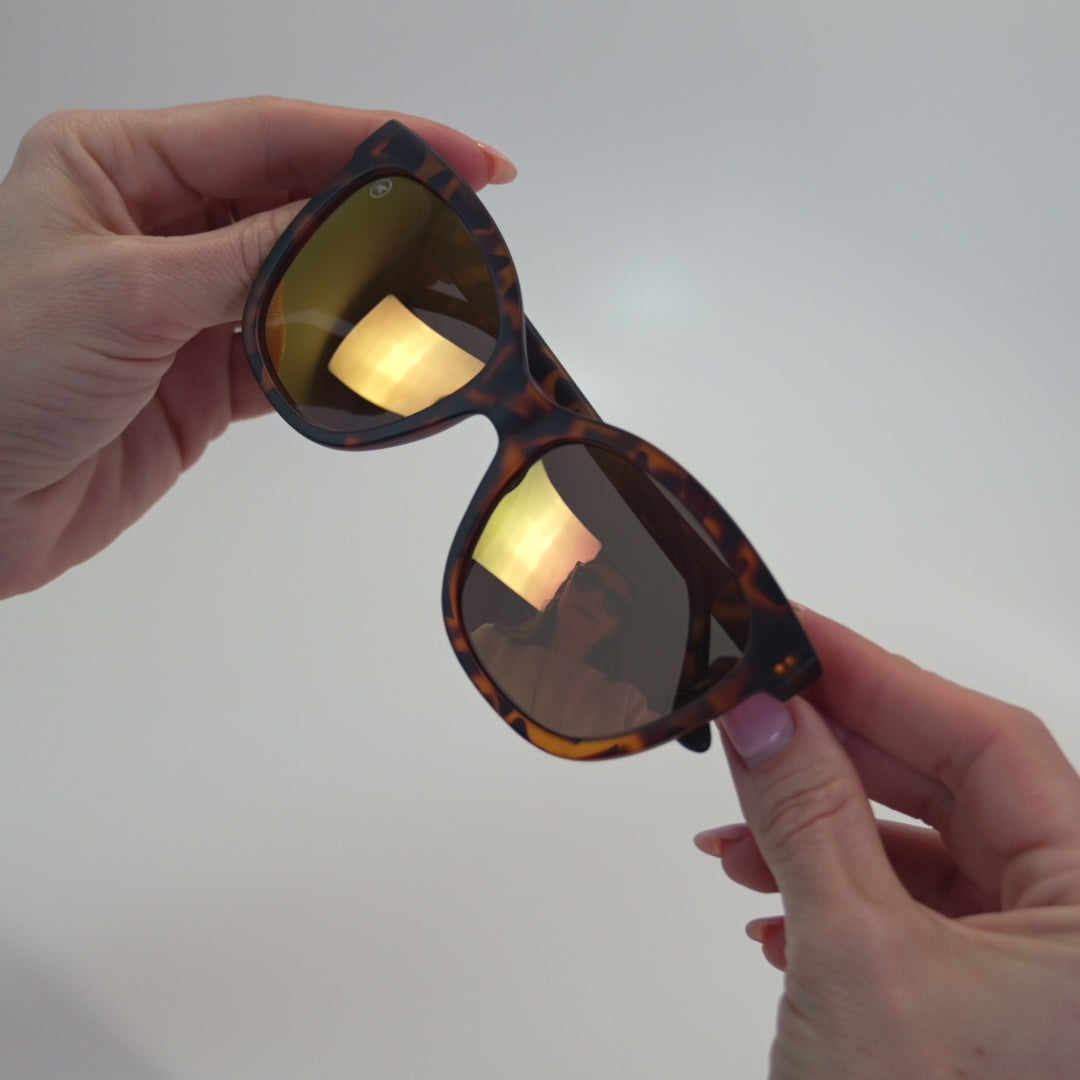Lifestyle video of Matte Tortoise Shell / Rose Gold Deja Views Sunglasses