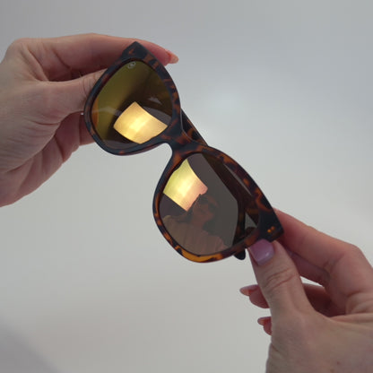 Lifestyle video of Matte Tortoise Shell / Rose Gold Deja Views Sunglasses