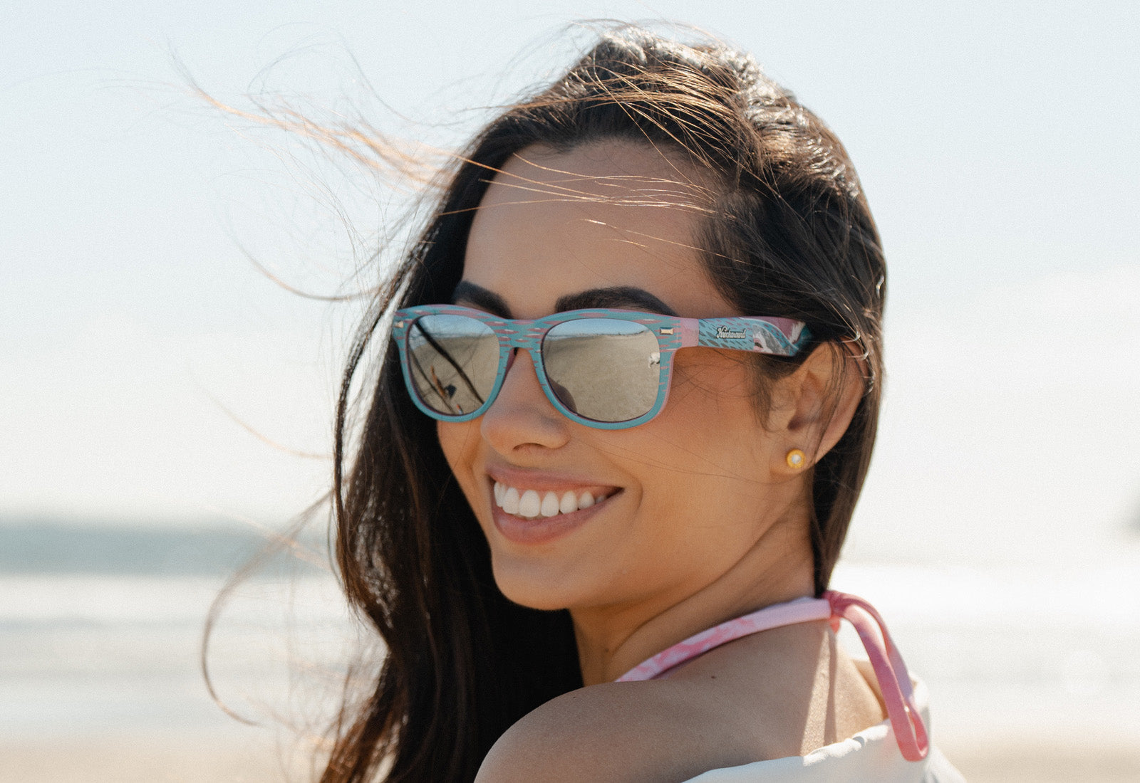 woman wearing shark week 2023 sunglasses