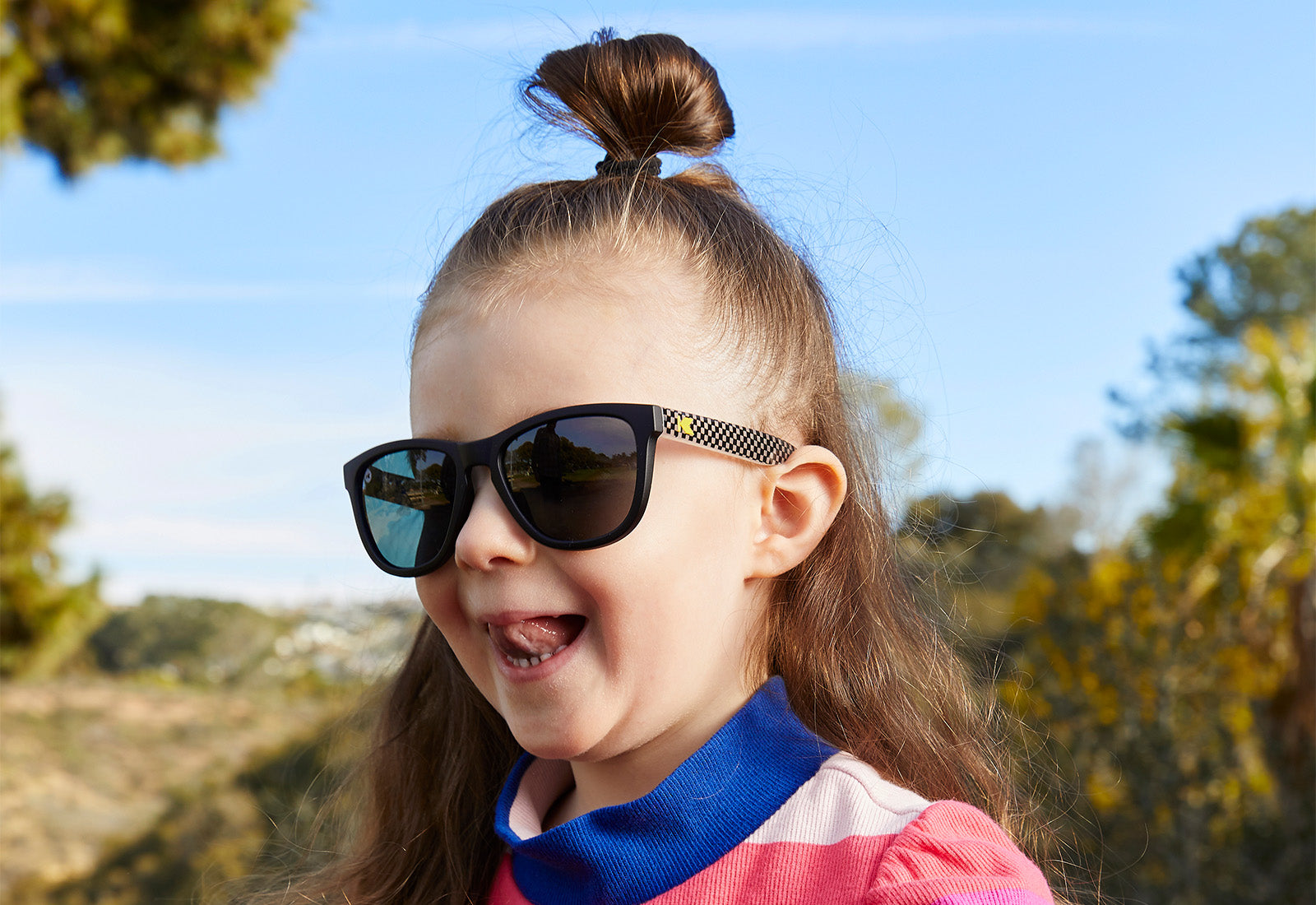 A girl kid wearing sunglasses