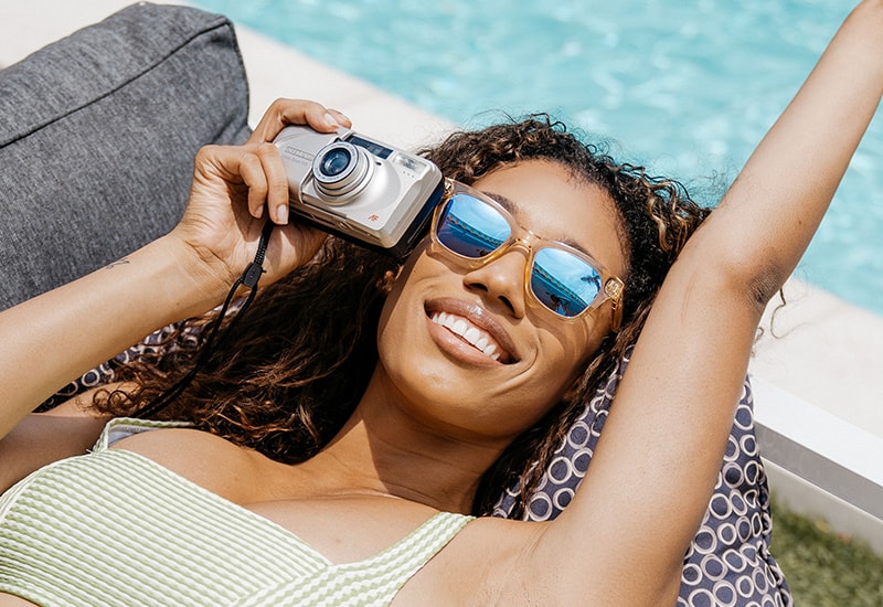 Sunglasses with Peach Frames and Polarized Blue Snow Opal Lenses, Model