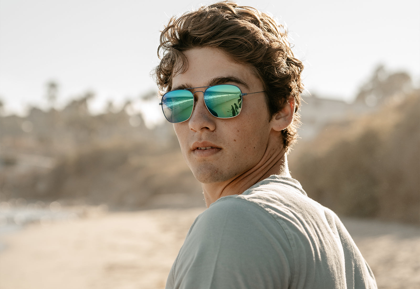 Sunglasses with Blue Metal Frames and Polarized Green Lenses, Model
