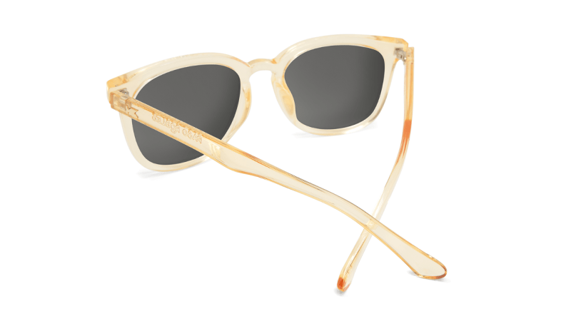 Sunglasses with Glossy Peach Frames and Polarized Snow Opal Lenses, Back