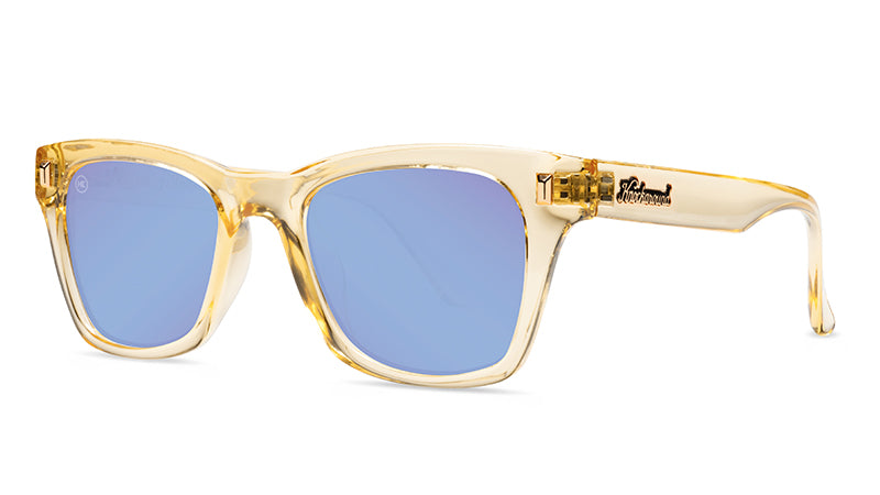 Sunglasses with Peach Frames and Polarized Blue Snow Opal Lenses, Threequarter