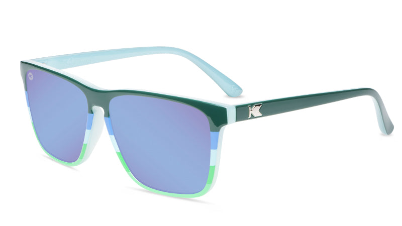Sunglasses with lakeside-inspired frames and polarized blue lenses, flyover
