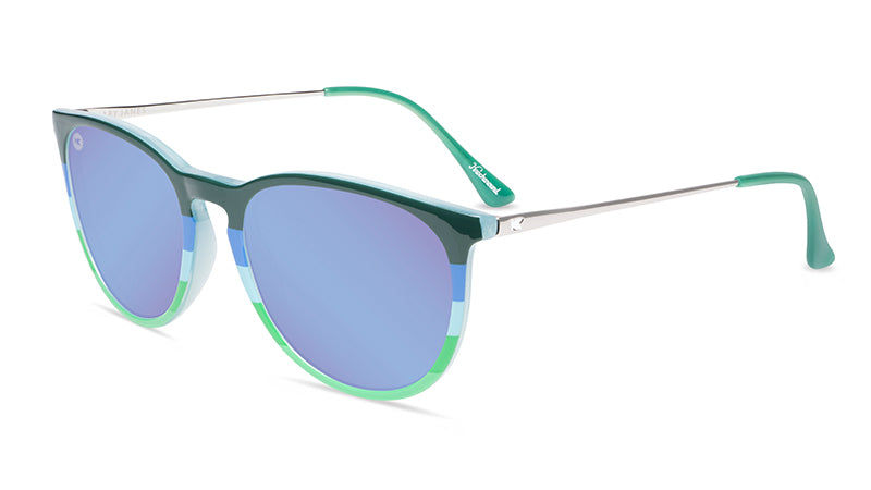 Sunglasses with lakeside-inspired frames and polarized blue lenses, flyover