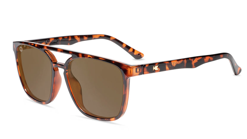 Sunglasses with Glossy Tortoise Shell Frames and Polarized Amber Lenses, Flyover