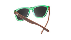 Sunglasses with glossy green fronts, wooden arms and polarized green lenses, back