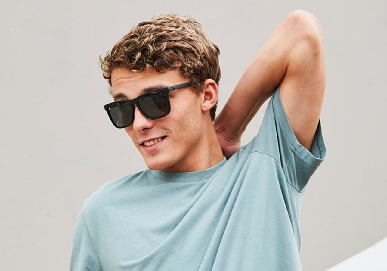 Sunglasses with Matte Black Frames and Polarized Black Smoke Lenses