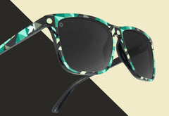 Sunglasses with Neo Geo Frames and Polarized Black Smoke Lenses, Float